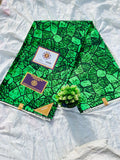 Vibrant green stone-pattern Ankara wax print