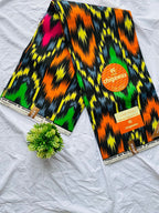 Vibrant multicolored ikat pattern Ankara fabric