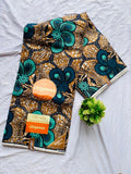 Gold and teal floral pattern Ankara fabric in image