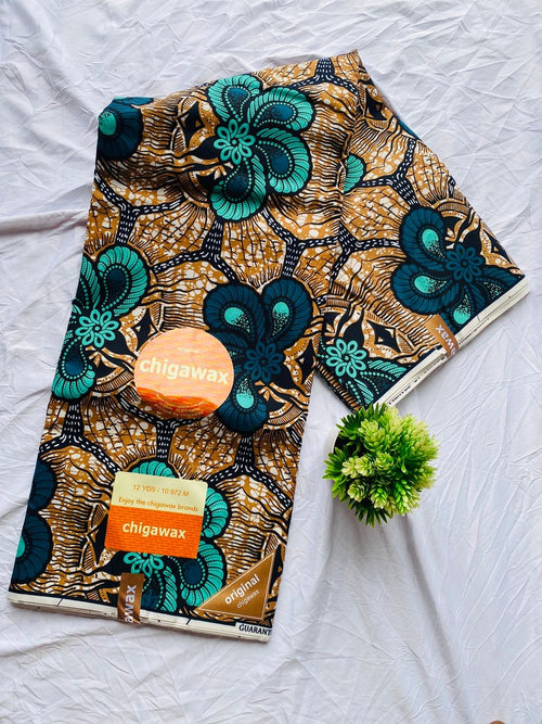 Gold and teal floral pattern Ankara fabric in image