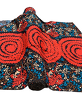Red and multi-colored floral print crepe fabric in image