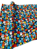 Multi-colored geometric capsule crepe fabric