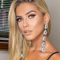 Long silver drop earrings with sleek elongated silhouette