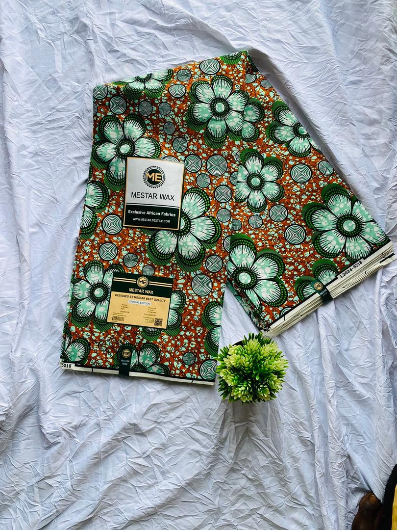 Rust and green floral Ankara fabric