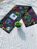 Vibrant neon geometric Ankara print